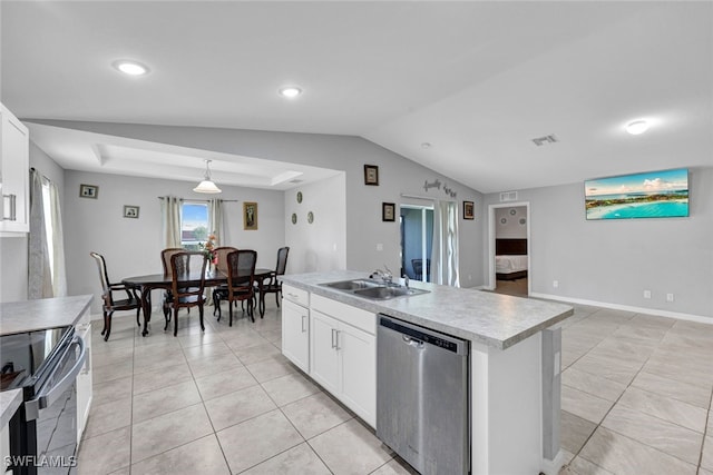 kitchen featuring light countertops, stainless steel dishwasher, a kitchen island with sink, a sink, and white cabinetry