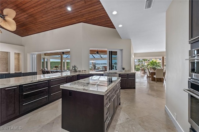 kitchen with visible vents, dark brown cabinets, wooden ceiling, oven, and black electric cooktop