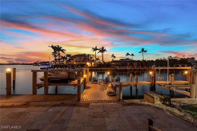 view of dock featuring a water view and boat lift