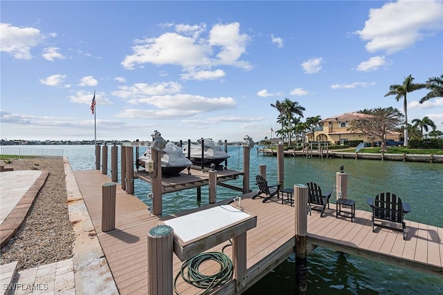 view of dock with a water view and boat lift