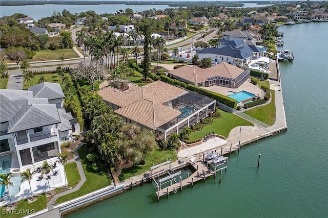 bird's eye view featuring a residential view and a water view