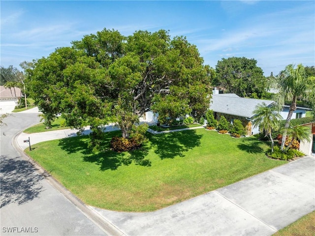 exterior space with a front lawn