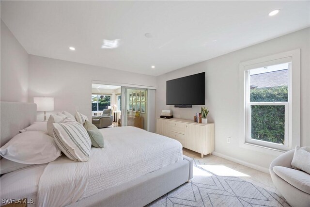 bedroom with baseboards, multiple windows, light carpet, and recessed lighting