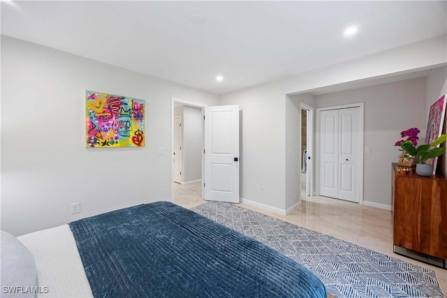 bedroom featuring recessed lighting and baseboards