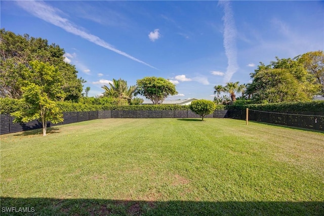 view of yard with a fenced backyard