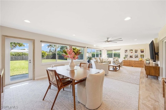 dining room with marble finish floor, baseboards, and recessed lighting