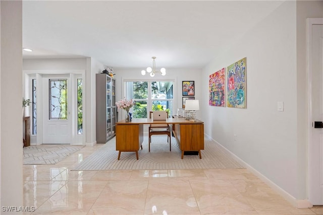 office space featuring marble finish floor, baseboards, and an inviting chandelier