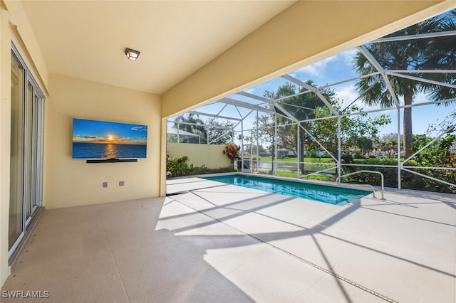 view of pool featuring a patio, a lanai, and a fenced in pool