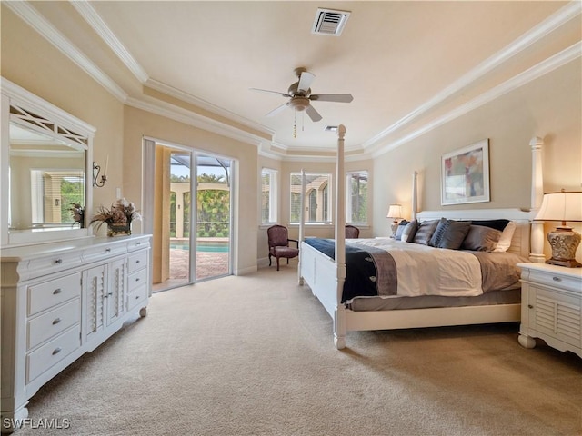 bedroom featuring access to outside, multiple windows, visible vents, and light colored carpet