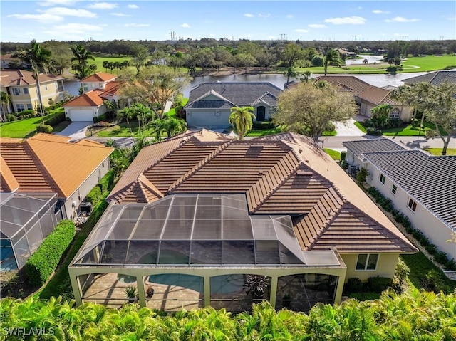 aerial view with a water view and a residential view