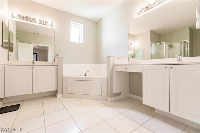 full bathroom with tile patterned flooring, a garden tub, a sink, two vanities, and a shower stall