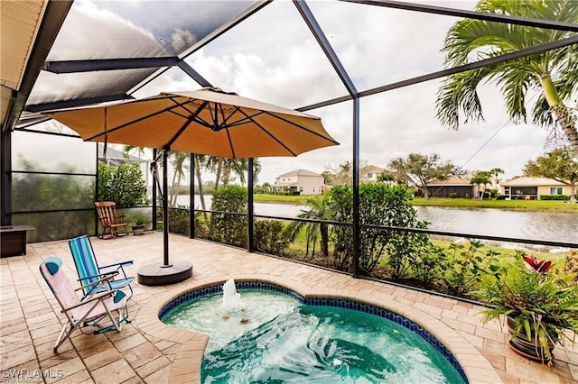 view of swimming pool featuring a patio, a water view, a lanai, and a jacuzzi