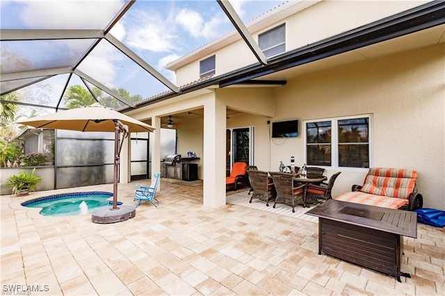 view of patio / terrace with a lanai, an outdoor pool, outdoor dining area, and a ceiling fan