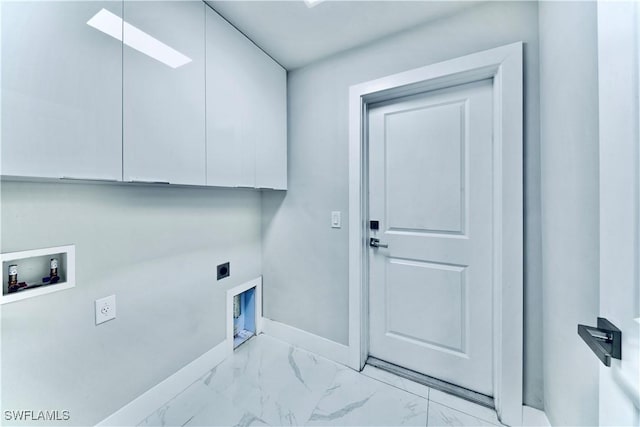 clothes washing area with cabinet space, baseboards, marble finish floor, washer hookup, and electric dryer hookup