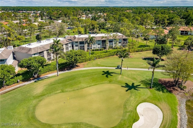 view of property's community featuring view of golf course