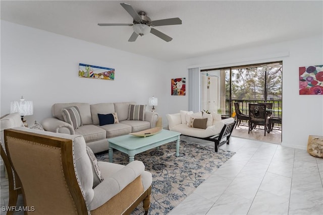 living room with a ceiling fan