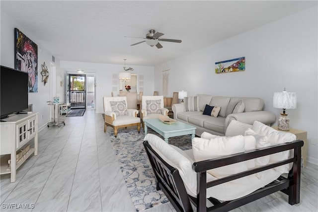 living room with a ceiling fan and visible vents