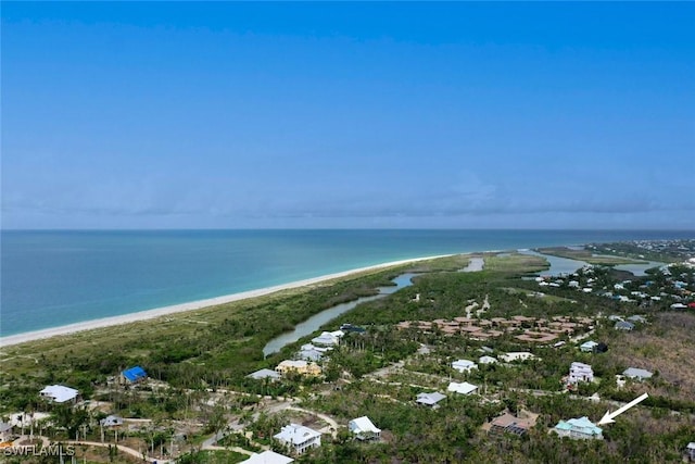 aerial view featuring a view of the beach and a water view