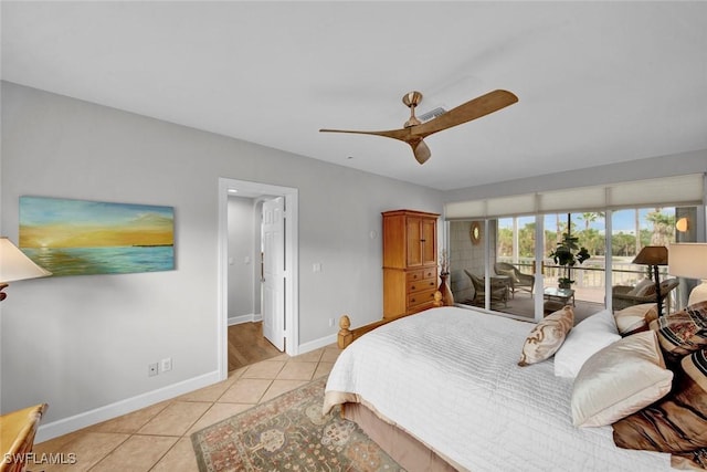 bedroom with access to exterior, light tile patterned flooring, baseboards, and a ceiling fan