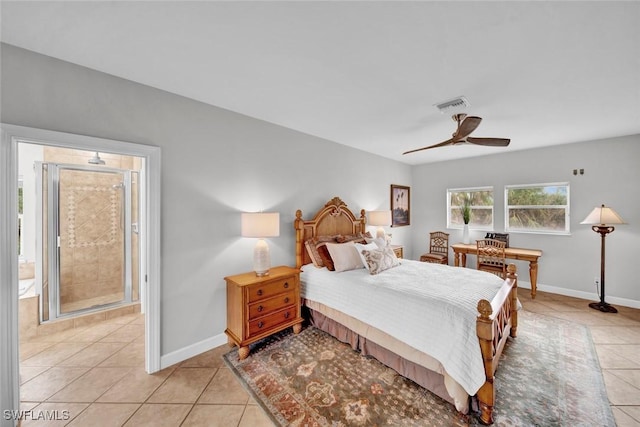 bedroom featuring light tile patterned floors, baseboards, and visible vents