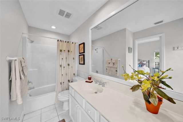 bathroom with visible vents, toilet, shower / tub combo, vanity, and tile patterned floors