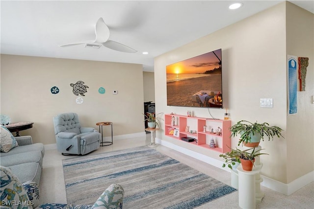 living room featuring baseboards, recessed lighting, visible vents, and a ceiling fan