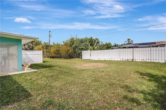 view of yard with fence