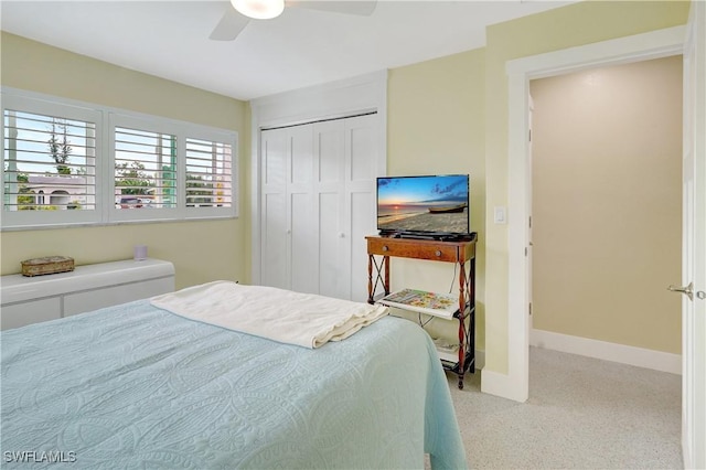 bedroom featuring a closet, ceiling fan, and baseboards