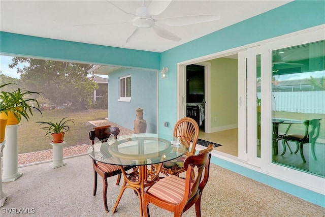 dining area featuring a ceiling fan