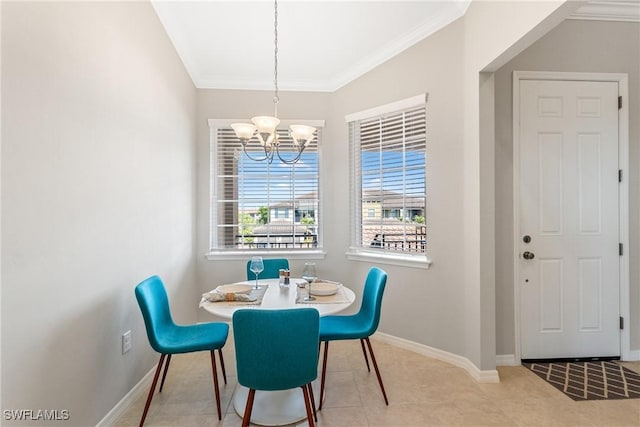 dining space with tile patterned floors, baseboards, a chandelier, and crown molding