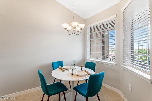 tiled dining room with vaulted ceiling, a chandelier, baseboards, and crown molding