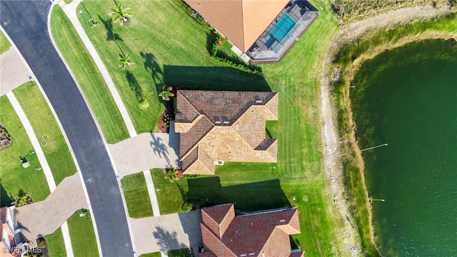 bird's eye view with a water view