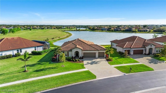 drone / aerial view featuring a water view