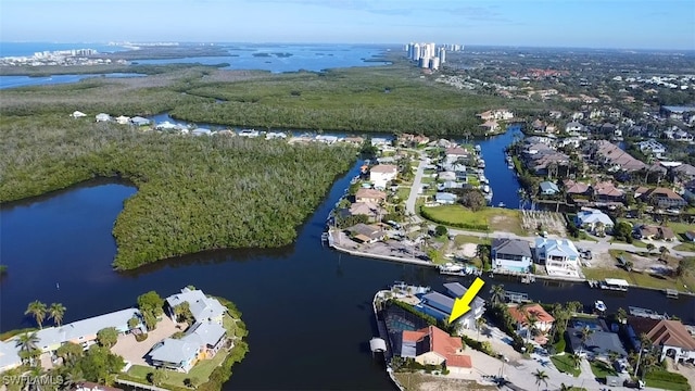 aerial view featuring a residential view and a water view