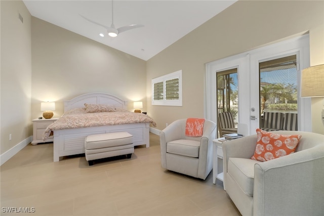 bedroom with access to outside, lofted ceiling, and baseboards