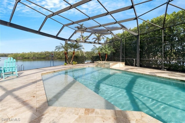 pool featuring a lanai, a patio, and an in ground hot tub