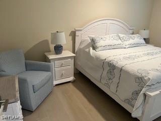 bedroom with light wood-type flooring