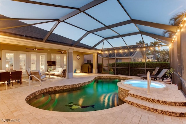 view of pool featuring french doors, an outdoor hangout area, a patio area, ceiling fan, and a lanai