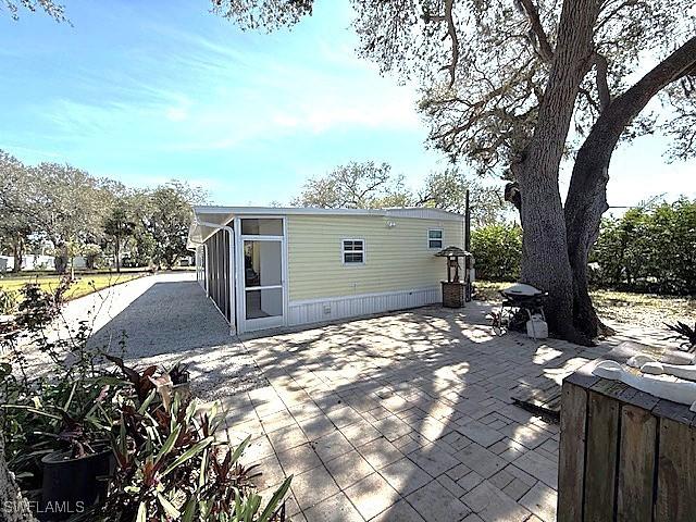 back of house featuring a patio