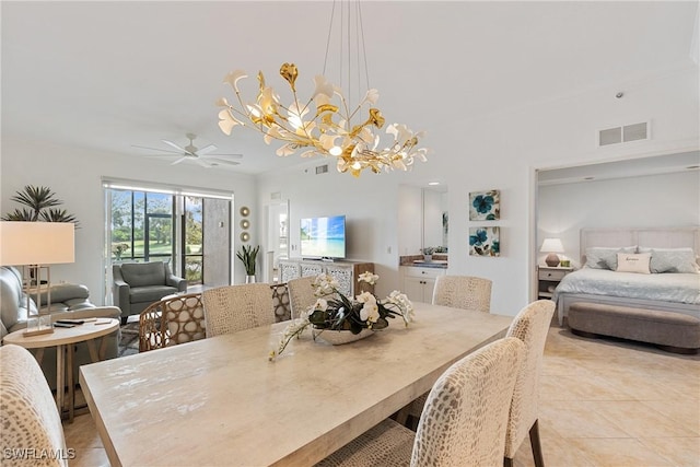 dining space featuring visible vents, a notable chandelier, and light tile patterned flooring