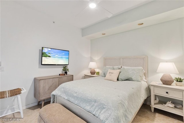 bedroom featuring light tile patterned floors, baseboards, and recessed lighting