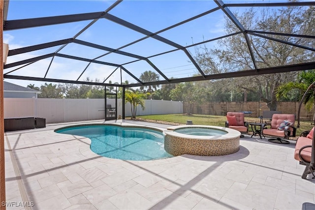 view of swimming pool featuring a lanai, a patio area, and a fenced backyard