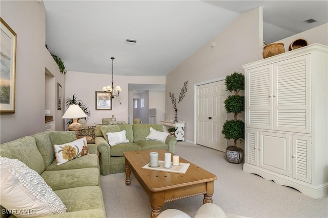 living room featuring light colored carpet, visible vents, a notable chandelier, and lofted ceiling