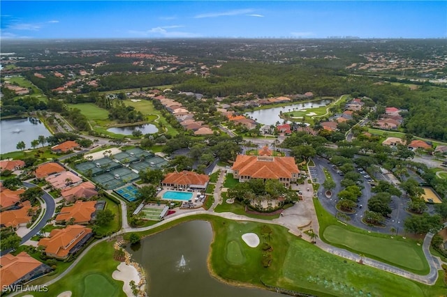 bird's eye view with a water view and golf course view