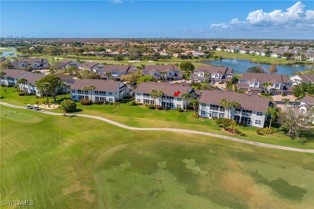 bird's eye view featuring view of golf course, a water view, and a residential view