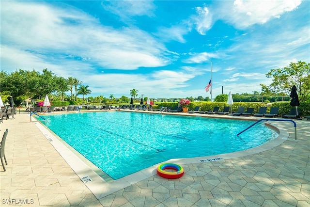 community pool featuring a patio area