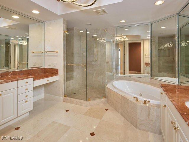 bathroom featuring recessed lighting, visible vents, a stall shower, vanity, and a tub with jets