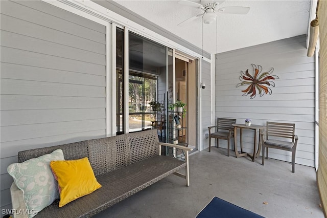 view of patio featuring a ceiling fan