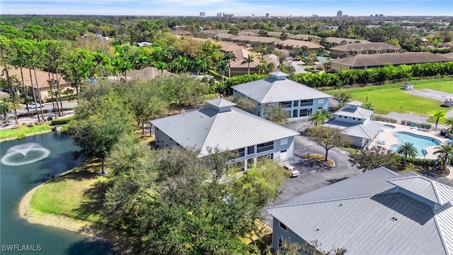 aerial view with a residential view and a water view