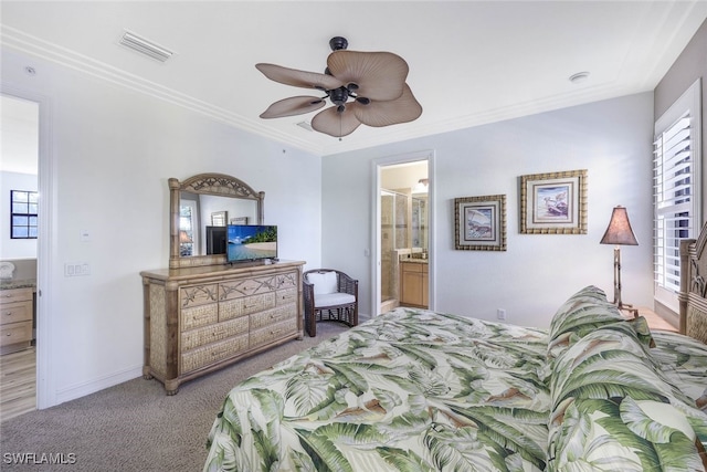 bedroom featuring light carpet, baseboards, visible vents, connected bathroom, and ornamental molding